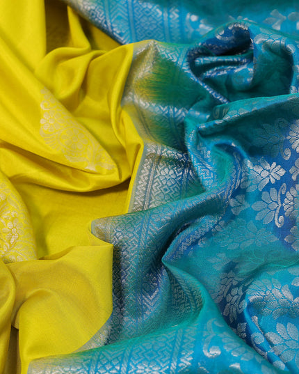 Pure soft silk saree lime yellow and dual shade of teal blue with silver zari woven buttas and silver zari woven border