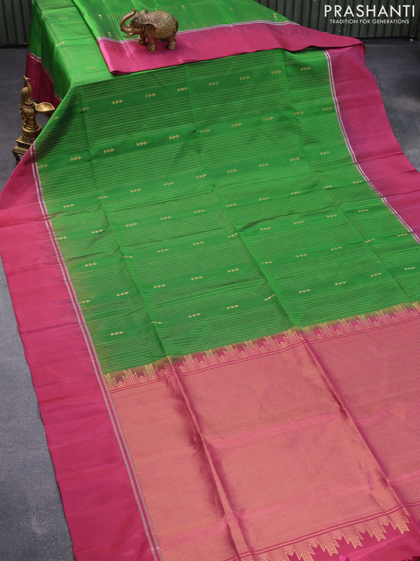 Pure soft silk saree green and dark pink with allover zari weaves and zari woven simple border