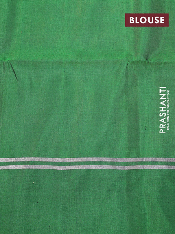 Pure soft silk saree dual shade of pinkish orange and green with allover zari weaves and zari woven simple border