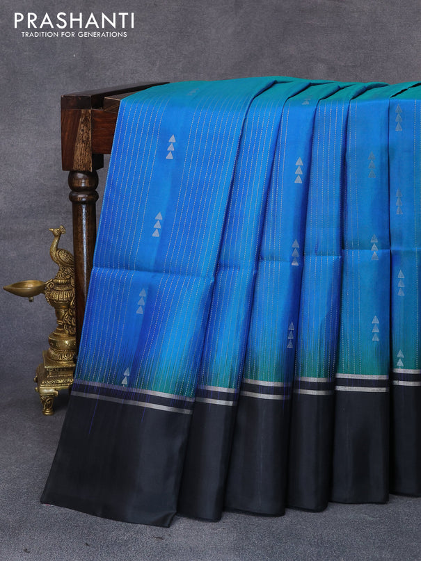 Pure soft silk saree dual shade of bluish green and black with allover zari weaves and zari woven simple border