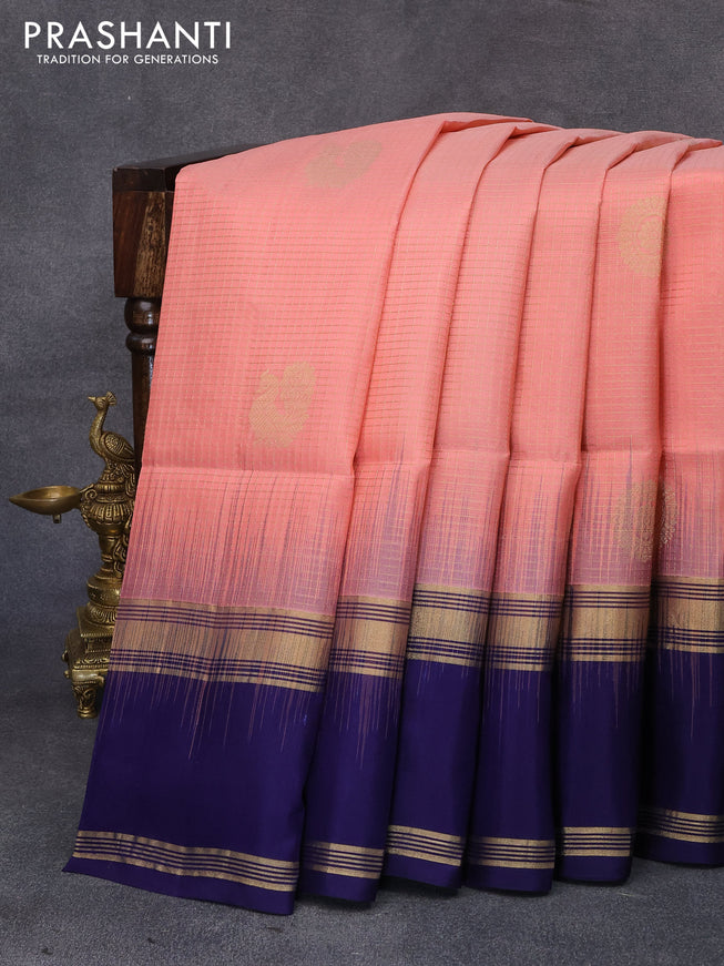 Pure soft silk saree peach orange and blue with allover small zari checks & buttas and rettapet zari woven border