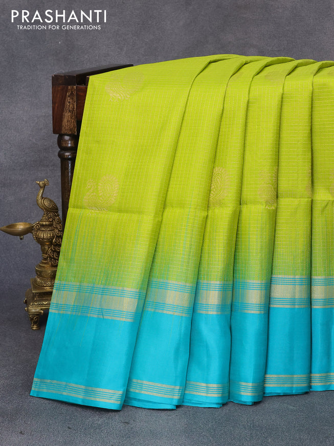 Pure soft silk saree fluorescent green and teal blue with allover small zari checks & buttas and rettapet zari woven border