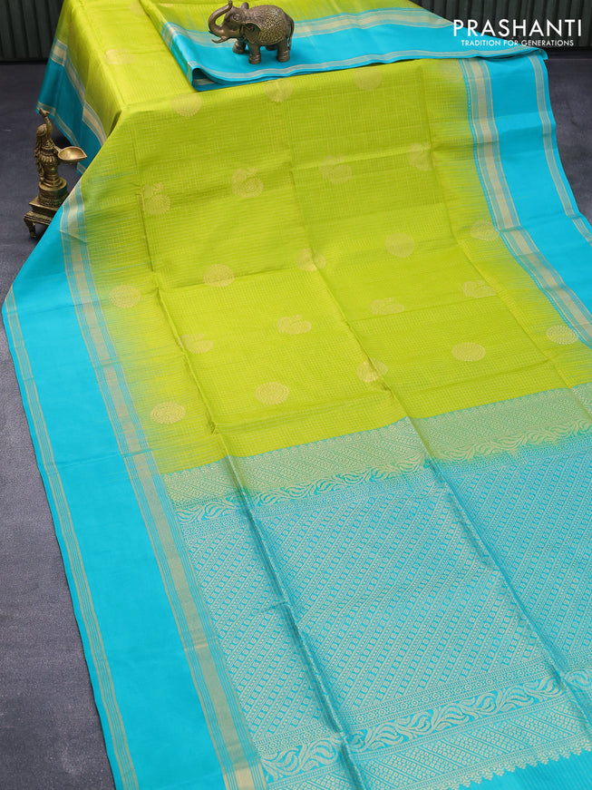 Pure soft silk saree fluorescent green and teal blue with allover small zari checks & buttas and rettapet zari woven border