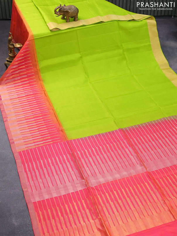 Pure soft silk saree fluorescent green and dual shade of pinkish orange with plain body and temple design long zari woven border