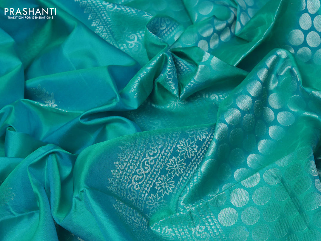 Pure soft silk saree dual shade of teal blue with silver zari woven buttas in borderless style