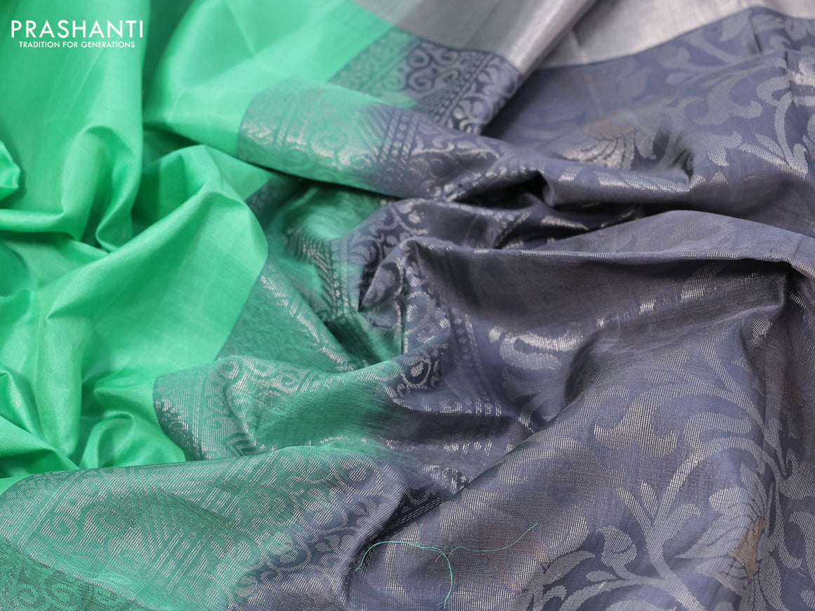 Pure soft silk saree pista green and grey with allover silver zari woven buttas and long rich silver zari woven border