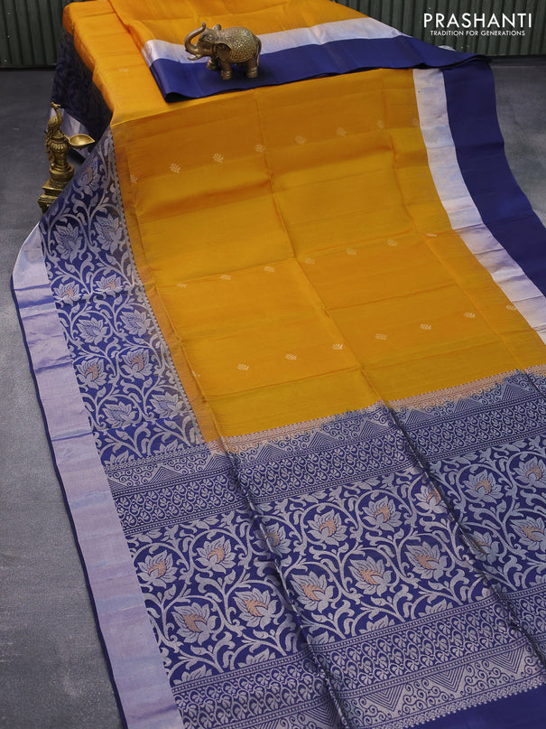 Pure soft silk saree mustard yellow and blue with allover silver zari woven buttas and long rich silver zari woven border