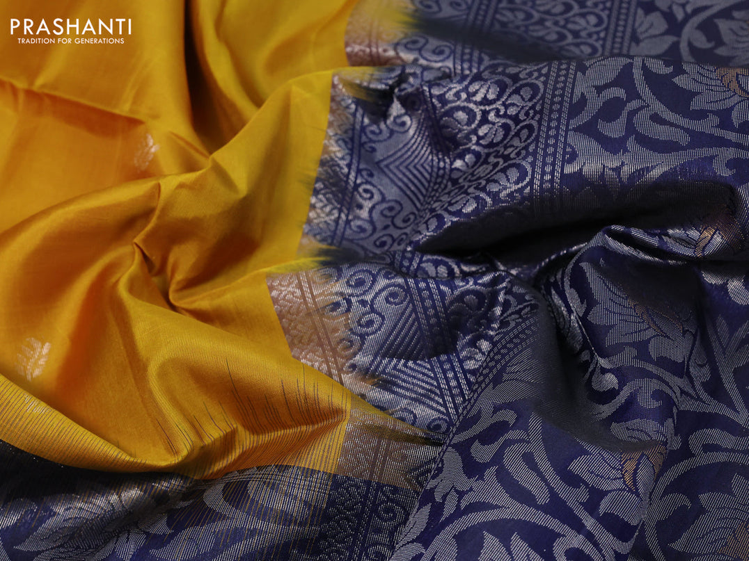 Pure soft silk saree mustard yellow and blue with allover silver zari woven buttas and long rich silver zari woven border