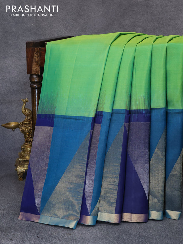 Pure soft silk saree dual shade of green and blue with silver zari woven buttas and long temple design zari woven border