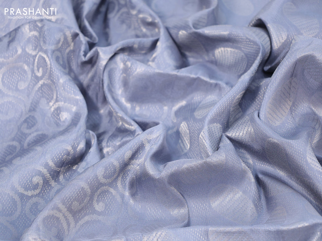 Pure soft silk saree pastel grey with allover silver zari woven brocade weaves and long silver zari woven border