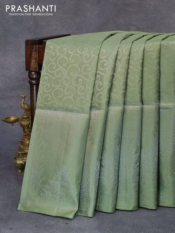 Pure soft silk saree green with allover silver zari woven brocade weaves and long silver zari woven border