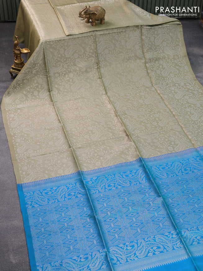 Pure soft silk saree elaichi green shade and dual shade of bluish green with allover silver zari woven brocade weaves in boderless style