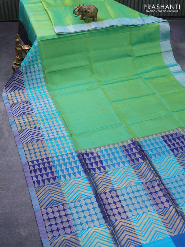 Pure soft silk saree dual shade of green and multi colour with plain body and long zari woven border