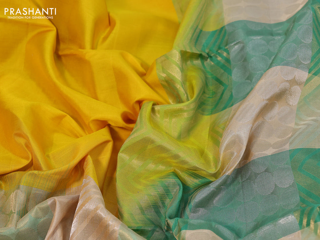Pure soft silk saree mango yellow and multi colour with plain body and long zari woven border