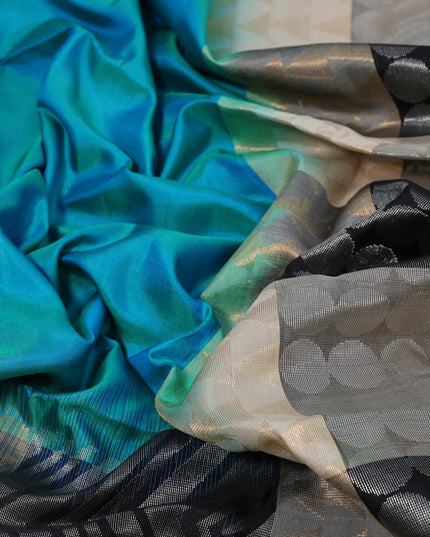 Pure soft silk saree dual shade of teal bluish green and multi colour with plain body and long zari woven border