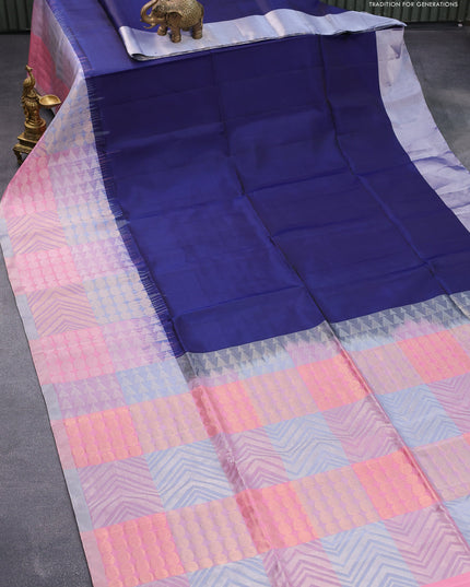 Pure soft silk saree blue and multi colour with plain body and long zari woven border