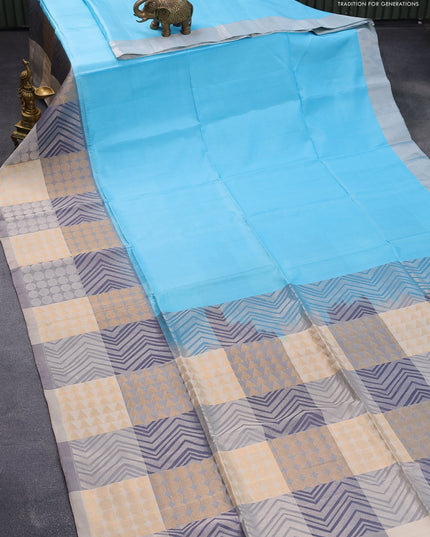 Pure soft silk saree light blue and multi colour with plain body and long zari woven border