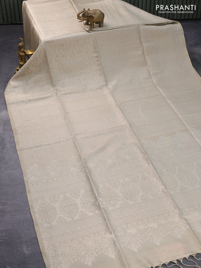 Pure soft silk saree grey shade with allover silver zari woven brocade weaves in borderless style