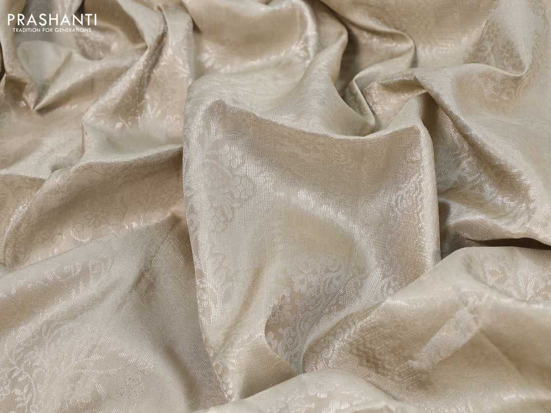 Pure soft silk saree grey shade with allover silver zari woven brocade weaves in borderless style