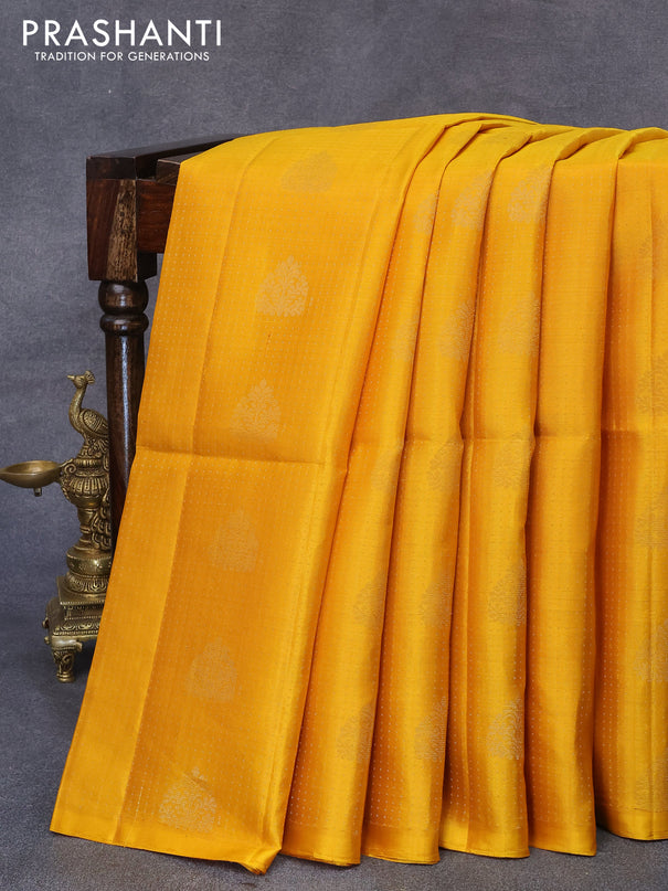 Pure soft silk saree yellow and dark sandal with allover zari weaves & buttas in borderless style