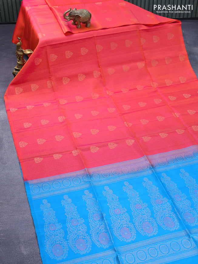 Pure soft silk saree dual shade of pinkish orange and cs blue with allover zari weaves & buttas in borderless style