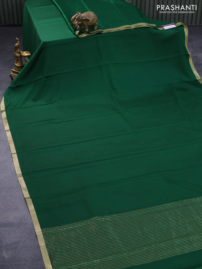 Pure mysore silk saree dark green with allover self emboss and zari woven border