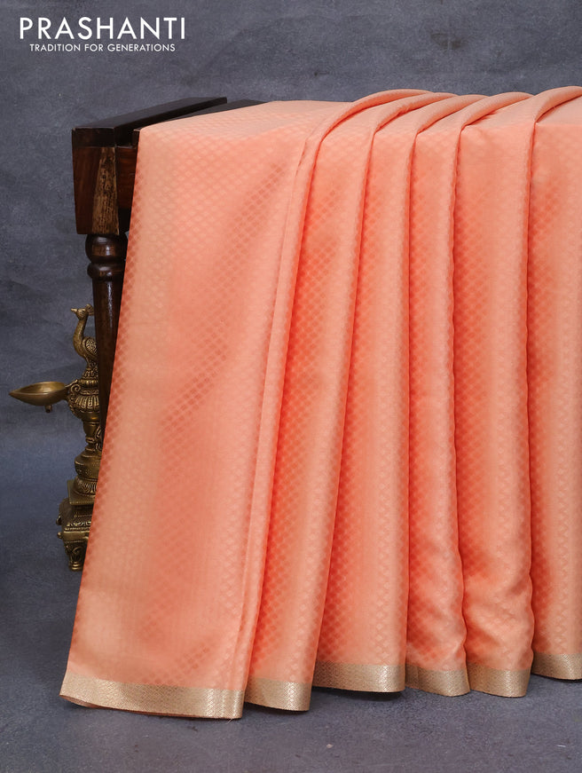 Pure mysore silk saree pastel peach orange with allover self emboss and zari woven border