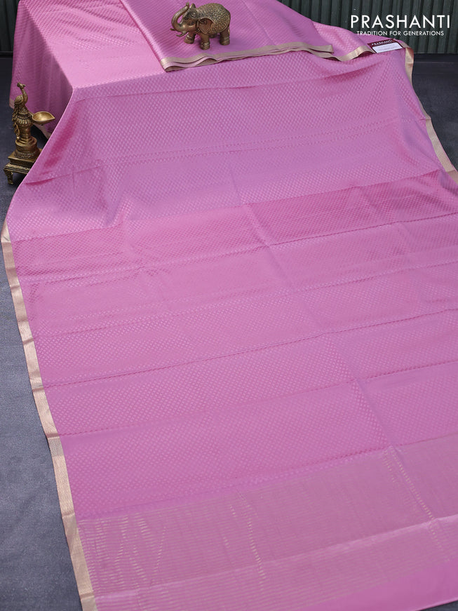Pure mysore silk saree mauve pink with allover self emboss and zari woven border