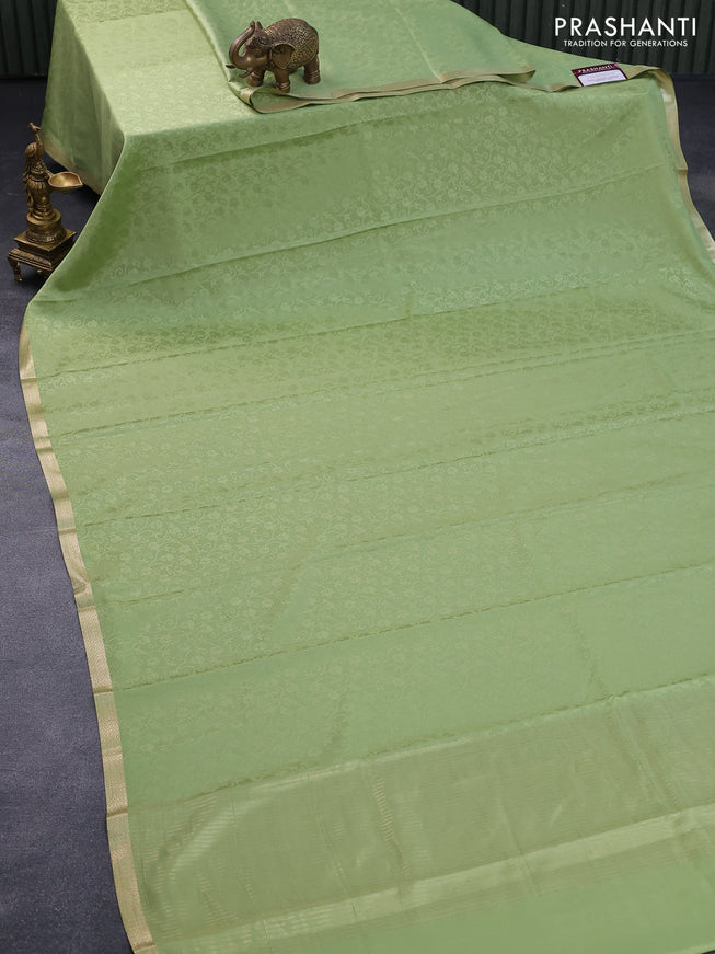 Pure mysore silk saree green shade with allover self emboss and zari woven border