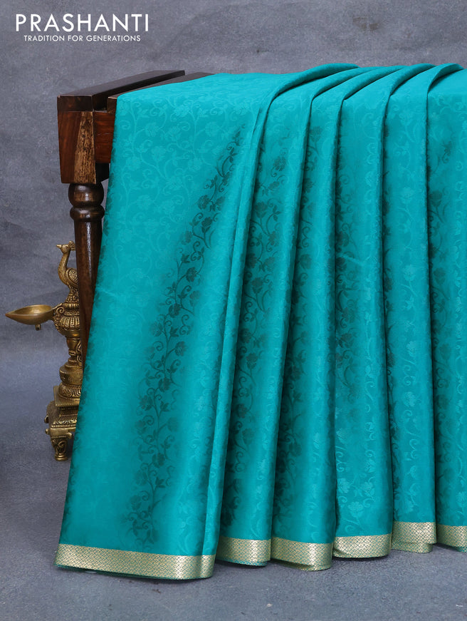Pure mysore silk saree teal green with allover self emboss and zari woven border