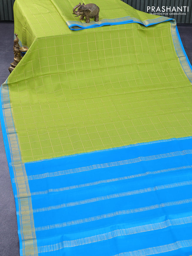 Pure mysore silk saree light green and cs blue with allover zari checked pattern and zari woven border