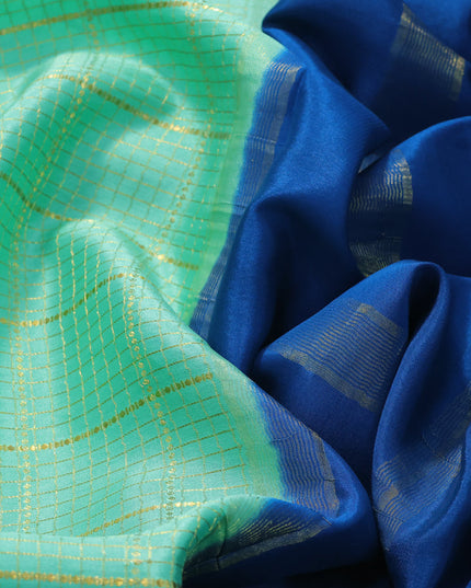 Pure mysore silk saree teal green shade and peacock blue with allover zari checked pattern and zari woven border