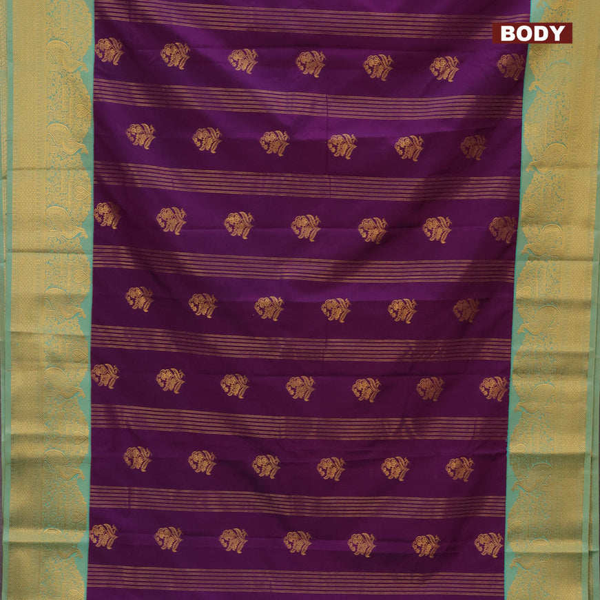 Semi kanjivaram silk saree deep purple and teal green shade with allover zari weaves & buttas and zari woven korvai border