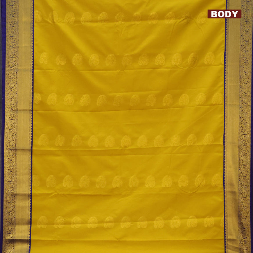 Semi kanjivaram silk saree mustard yellow and blue with zari woven paisley buttas and paisley zari woven korvai border