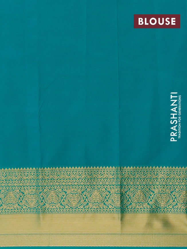 Semi kanjivaram silk saree purple and teal green with allover zari weaves & buttas and zari woven korvai border