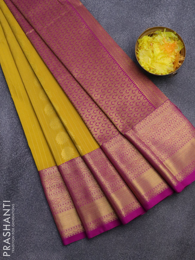Semi kanjivaram silk saree mustard yellow and purple with allover zari weaves & buttas and long zari woven korvai border