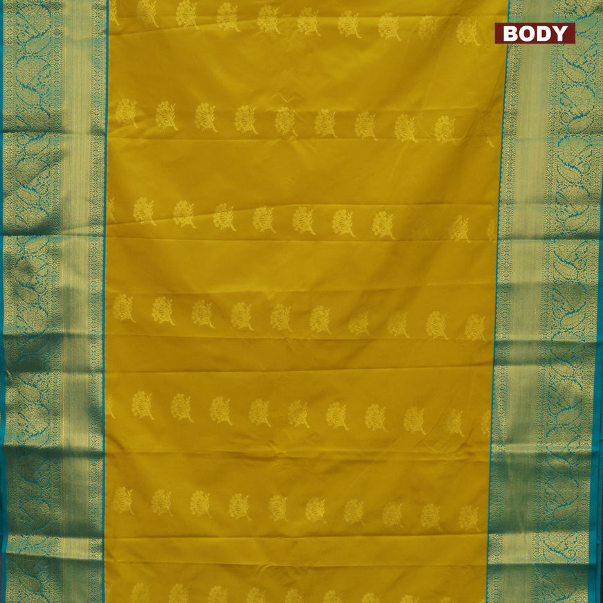 Semi kanjivaram silk saree mustard yellow and teal blue with zari woven buttas and zari woven korvai border