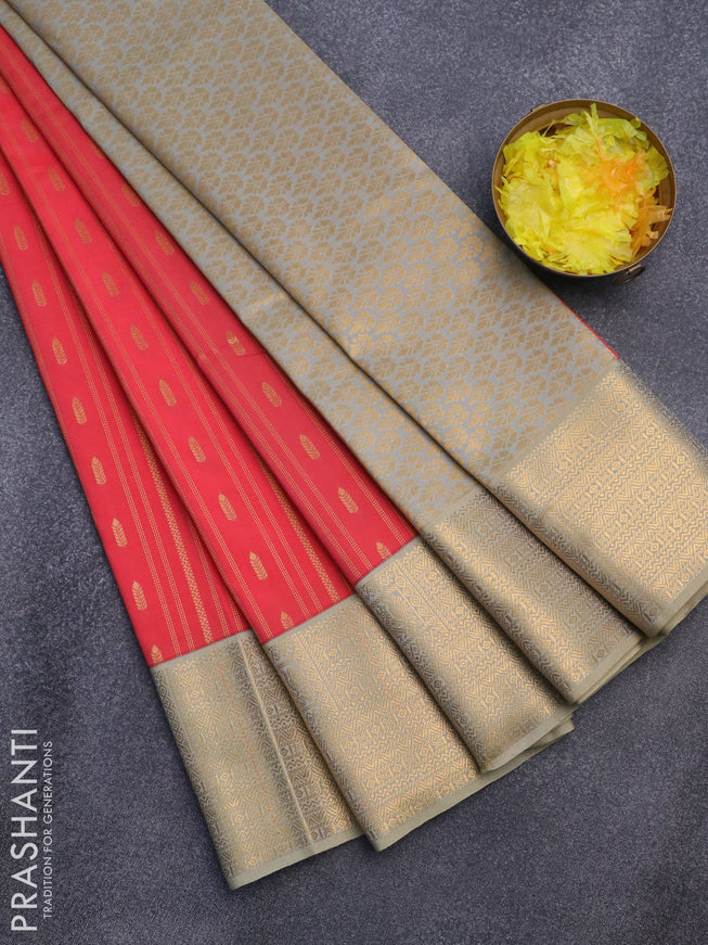 Semi kanjivaram silk saree pinkish orange and dual shade of greyish beige with allover zari weaves and zari woven korvai border