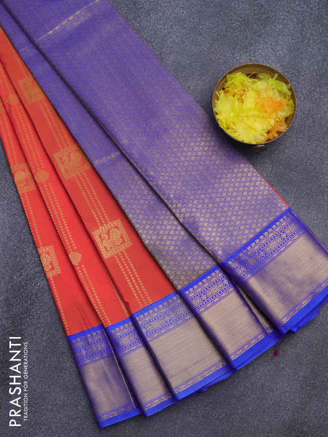 Semi kanjivaram silk saree dual shade of orangish pink and blue with allover zari weaves and zari woven korvai border