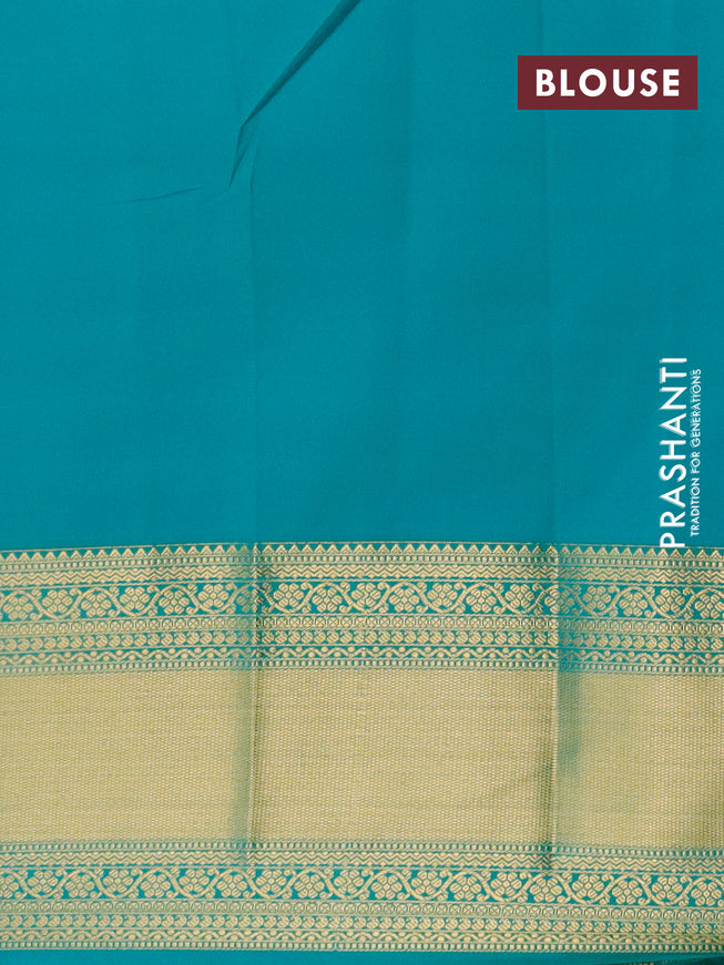 Semi kanjivaram silk saree pink shade and teal green with allover zari weaves & buttas and long zari woven korvai border