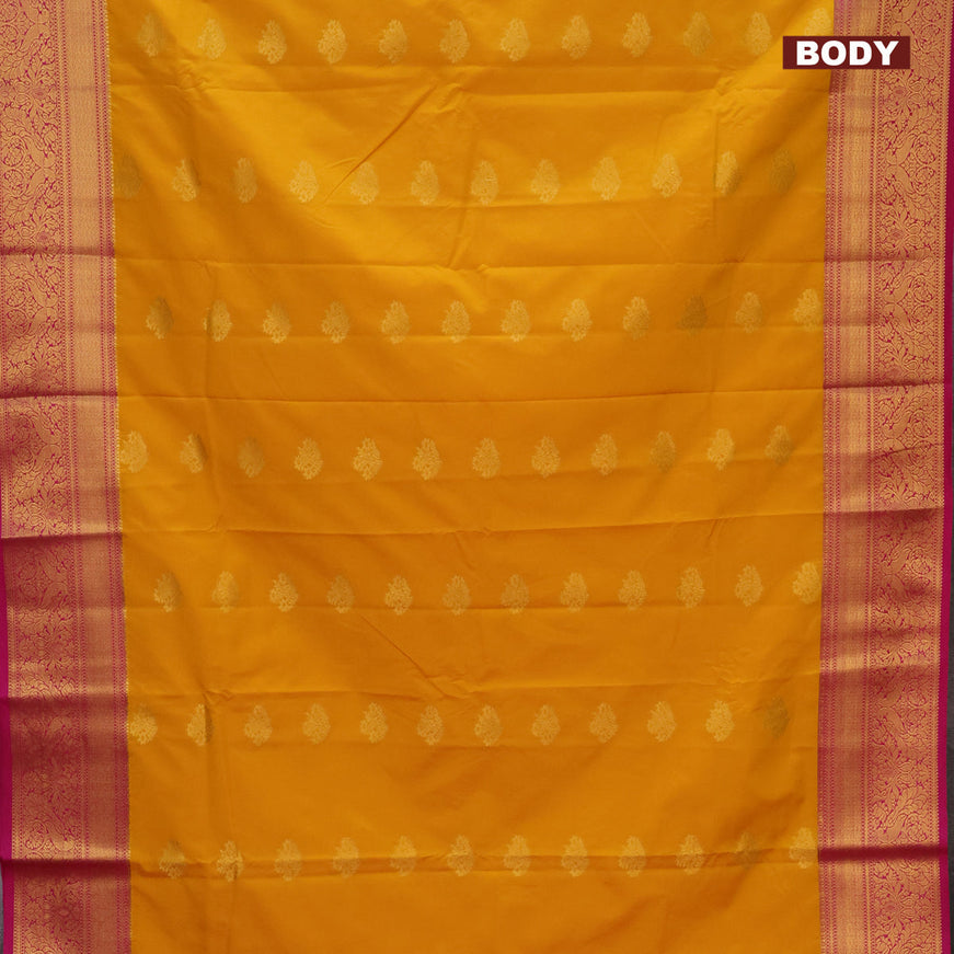 Semi kanjivaram silk saree mango yellow and pink with zari woven buttas and zari woven korvai border