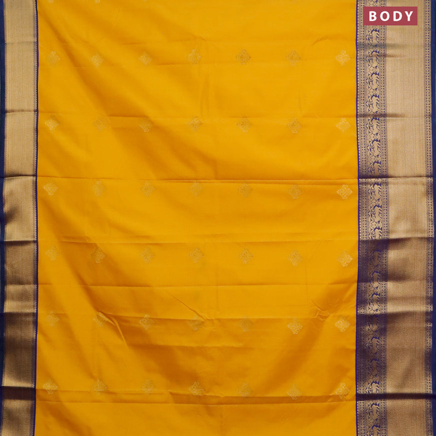 Semi kanjivaram silk saree yellow and dual shade of bluish green with zari woven buttas and long zari woven korvai border