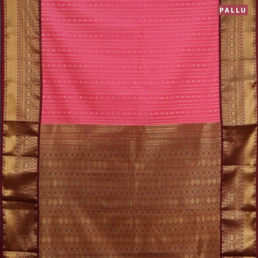 Semi kanjivaram silk saree light pink and maroon with allover zari weaves and zari woven korvai border