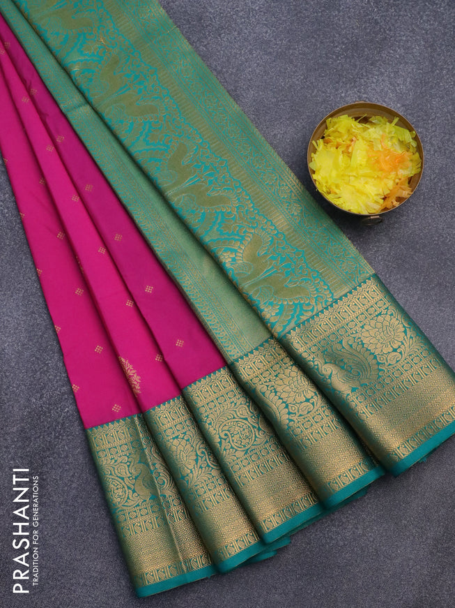 Semi kanjivaram silk saree pink and teal green with zari woven buttas and long zari woven korvai border