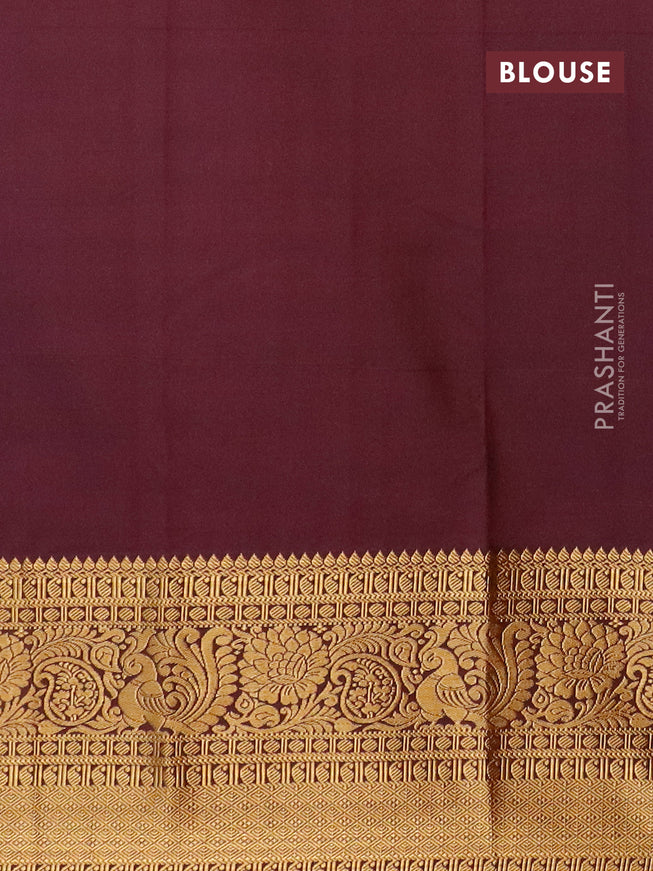 Semi kanjivaram silk saree blue and wine shade with zari woven buttas and long zari woven korvai border