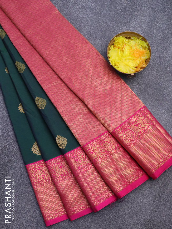 Semi kanjivaram silk saree dual shade of dark greenish blue and pink with zari woven buttas and zari woven korvai border