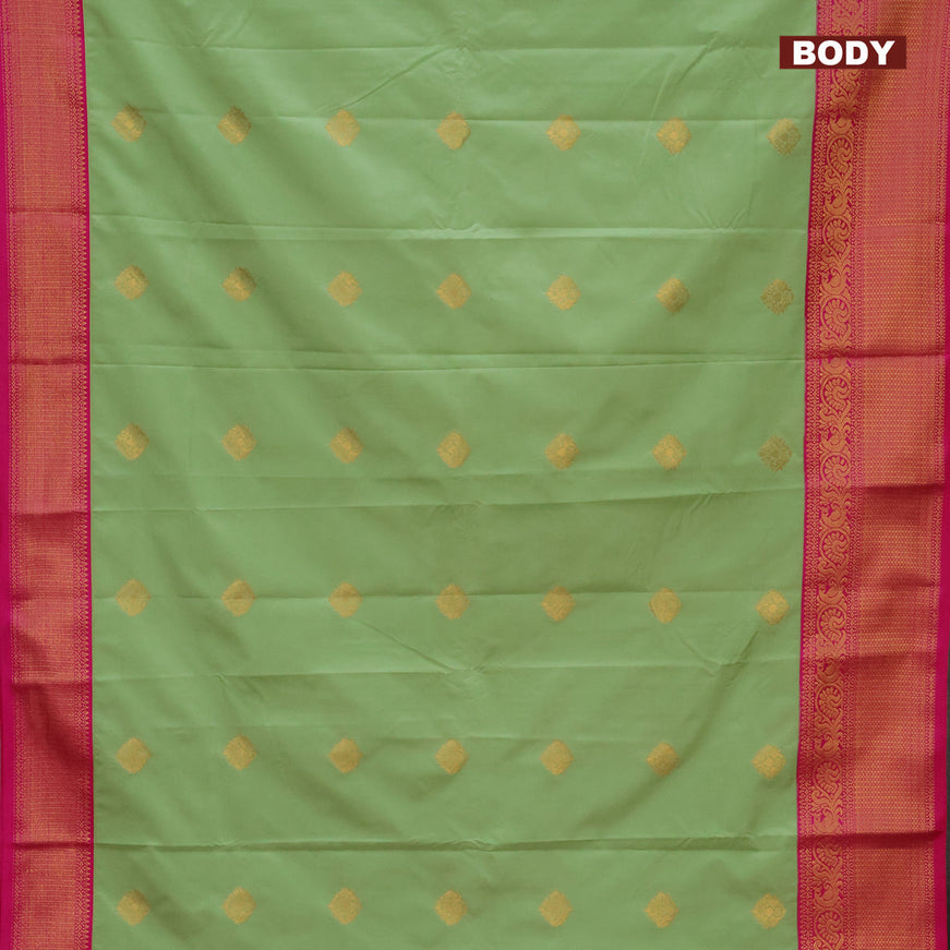 Semi kanjivaram silk saree pista green and pink with zari woven buttas and zari woven korvai border