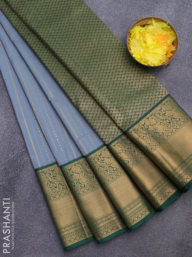 Semi kanjivaram silk saree grey and dark green with allover zari weaves and long zari woven korvai border