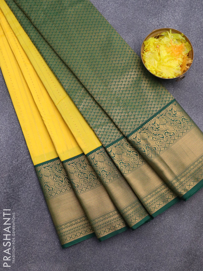 Semi kanjivaram silk saree yellow and green with allover zari weaves and zari woven korvai border