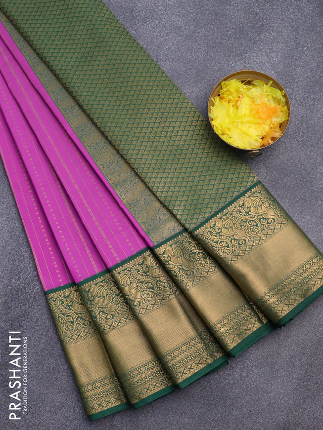 Semi kanjivaram silk saree purple and green with allover zari weaves and long zari woven korvai border